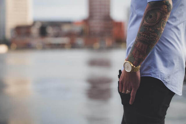 Low cut shot of watch on man's wrist - best men's watches under $500 concept image